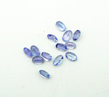 Lade das Bild in den Galerie-Viewer, E160 Tansanite 1ct.
